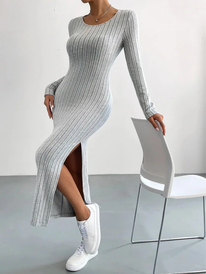 Autumn and winter casual plus size womens knitted dress sexy slim elegant retro long sleeved round neck slotted 241007