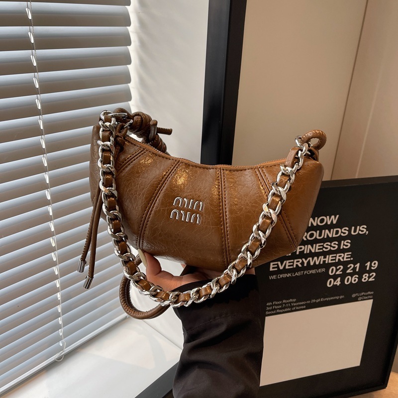 designer winter croissant cross body women's 2024 new niche fashion single shoulder handbag
