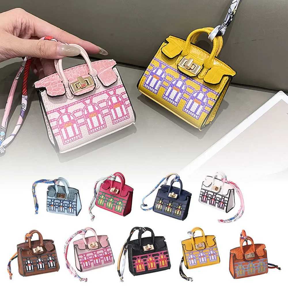 Keychains Lanyards 2024 Mini Bag Pendant Crocodile Pattern Exquisite Variation High end Earplug Red Mouth Charter Keychain H241010