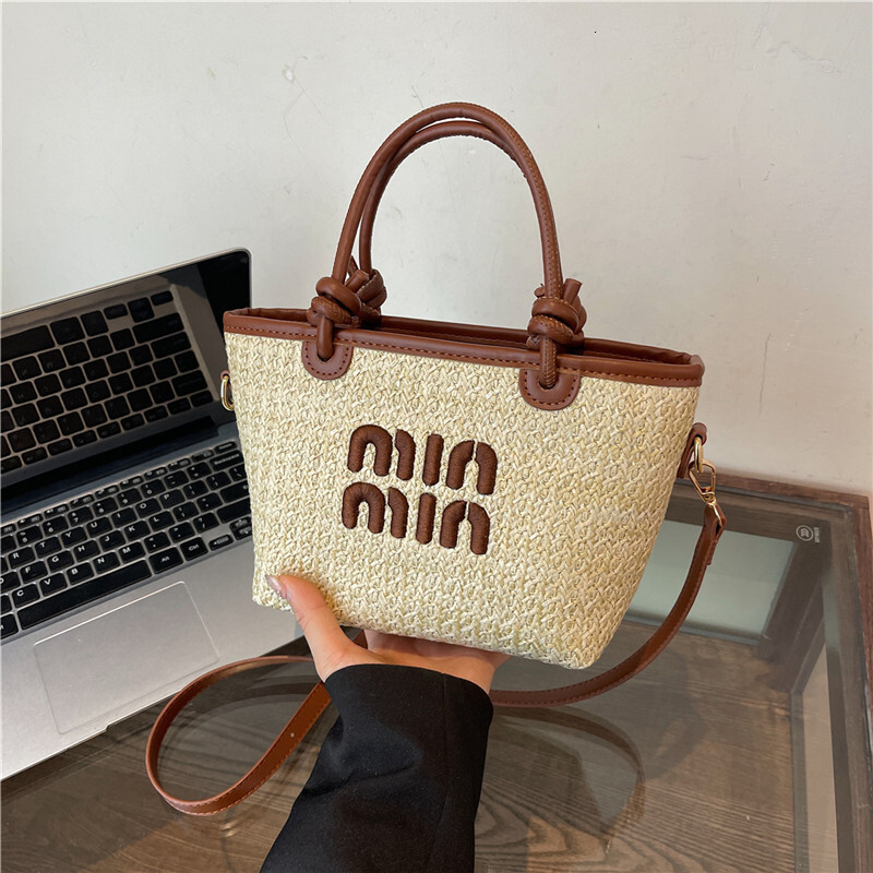 2024 new designer beach grass woven women's embroidered thread fashion cross bag, female niche design shoulder bag