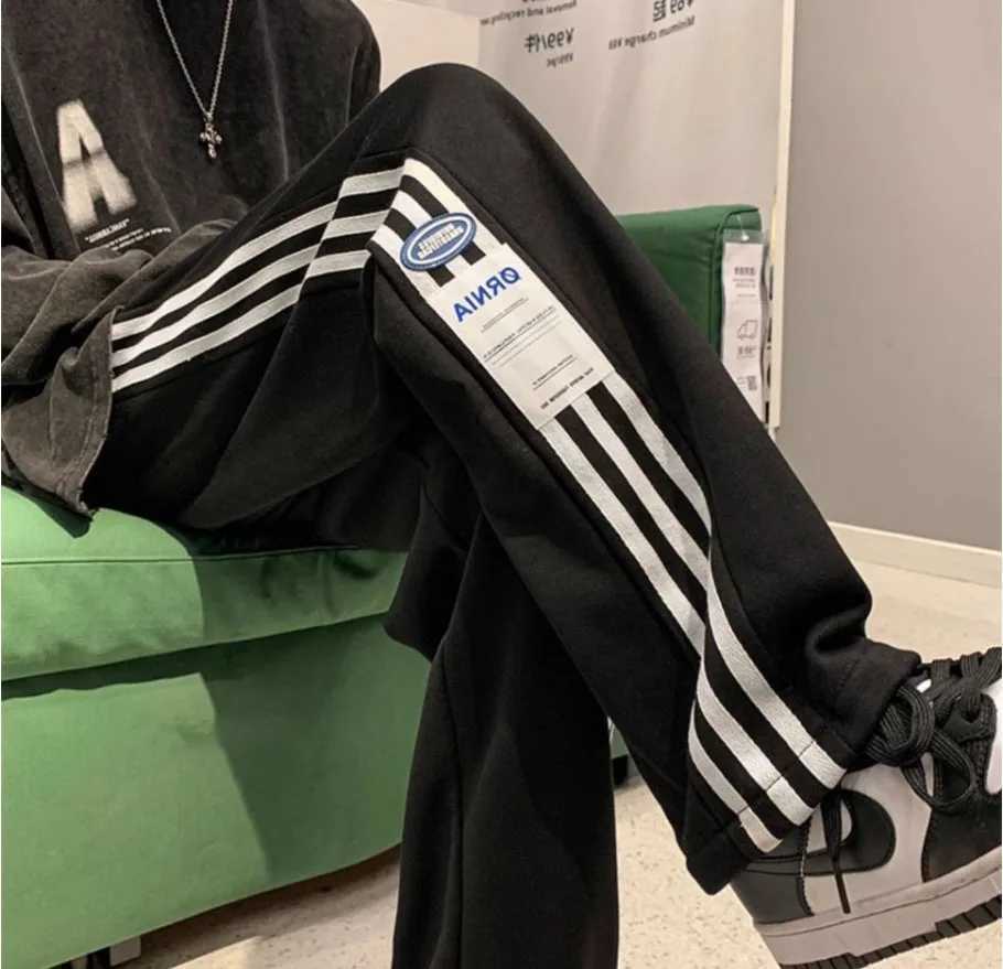 American high-end street pants mens spring and summer thin fashion brand casual sports pants young loose straight leg pants W241009