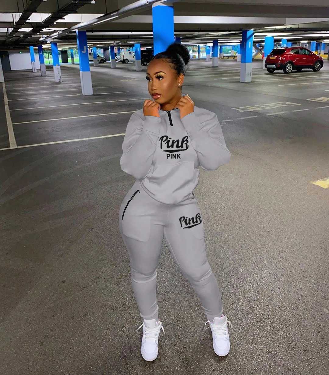 Womens new track and field suit set pink printed sports and leisure suit womens sports shirt top+pants 2-piece set sports shirt for spring and summer 