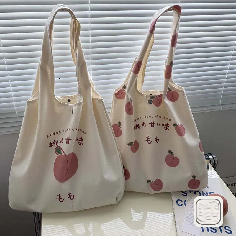 Peach Canvas handbag wallet and tote bag suitable for female shoppers. Cute shoulder bag Japanese Kawaii style printed eco bag 241008
