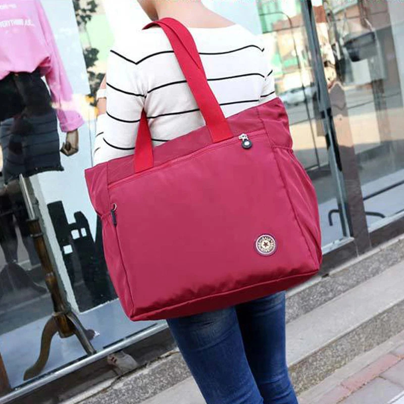 Womens solid color handbag Communicating shoulder bag Leisure Simple Mommy Go Out Bag large capacity nylon handbag 241008