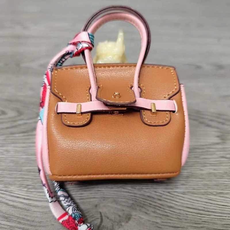 Keychains Lanyards Fashionable mini patchwork leather bag ladies cute headphone keychain H241010