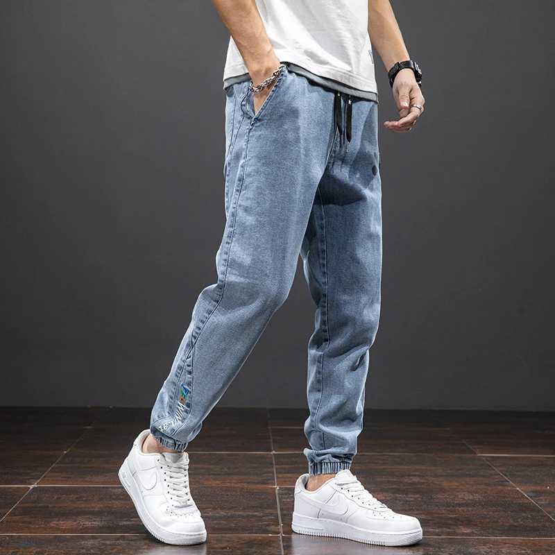 Large size elastic workwear jeans mens ankle tied Harlan pants wear-resistant and fat added plus size trendy and looseX241009