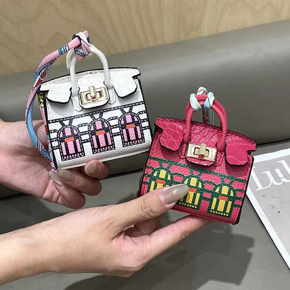 Keychains Lanyards 2024 Mini Bag Pendant Crocodile Pattern Exquisite Variation High end Earplug Red Mouth Charter Keychain H241010