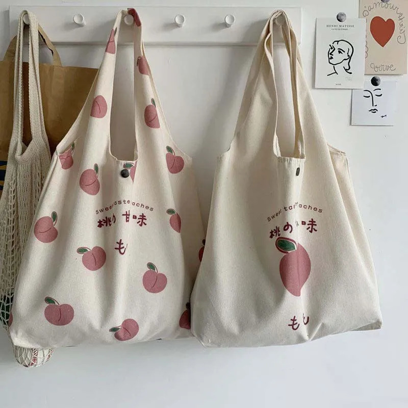 Peach Canvas handbag wallet and tote bag suitable for female shoppers. Cute shoulder bag Japanese Kawaii style printed eco bag 241008