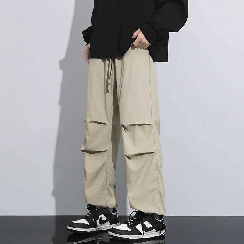 Large zipper pants mens and womens outdoor triple defense charging straight pants work pants Trouser waterproof and breathable W241009