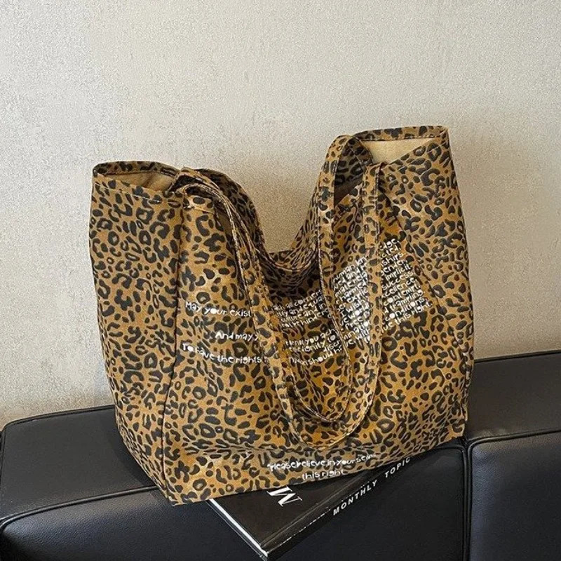 Autumn and winter large capacity womens bag Korean leopard print canvas shopping bag Ins casual lazy shoulder handbag 241008