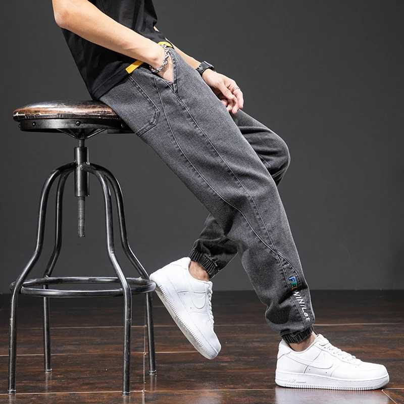 Large size elastic workwear jeans mens ankle tied Harlan pants wear-resistant and fat added plus size trendy and looseX241009