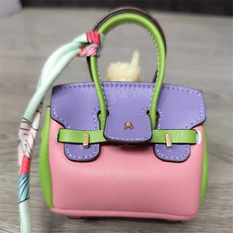 Keychains Lanyards Fashionable mini patchwork leather bag ladies cute headphone keychain H241010