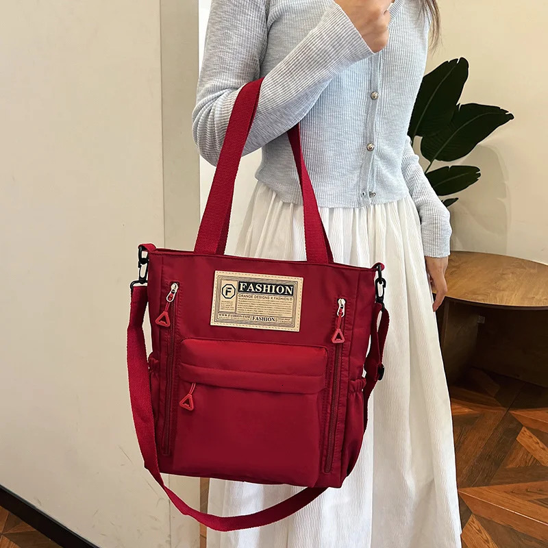 Latest female teenage shoulder bag Korean contrasting color handbag fashionable nylon Korean cross body shopping bag 241008