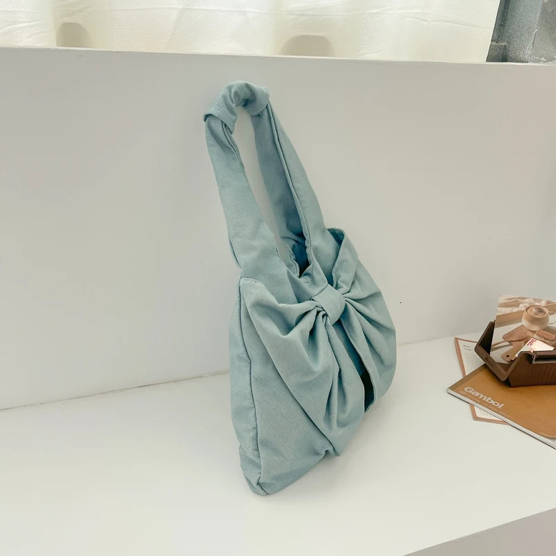 1 solid color bow shaped denim bag womens waist bag large capacity handbag 241008