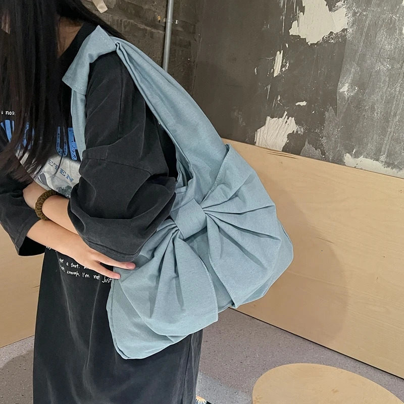 1 solid color bow shaped denim bag womens waist bag large capacity handbag 241008
