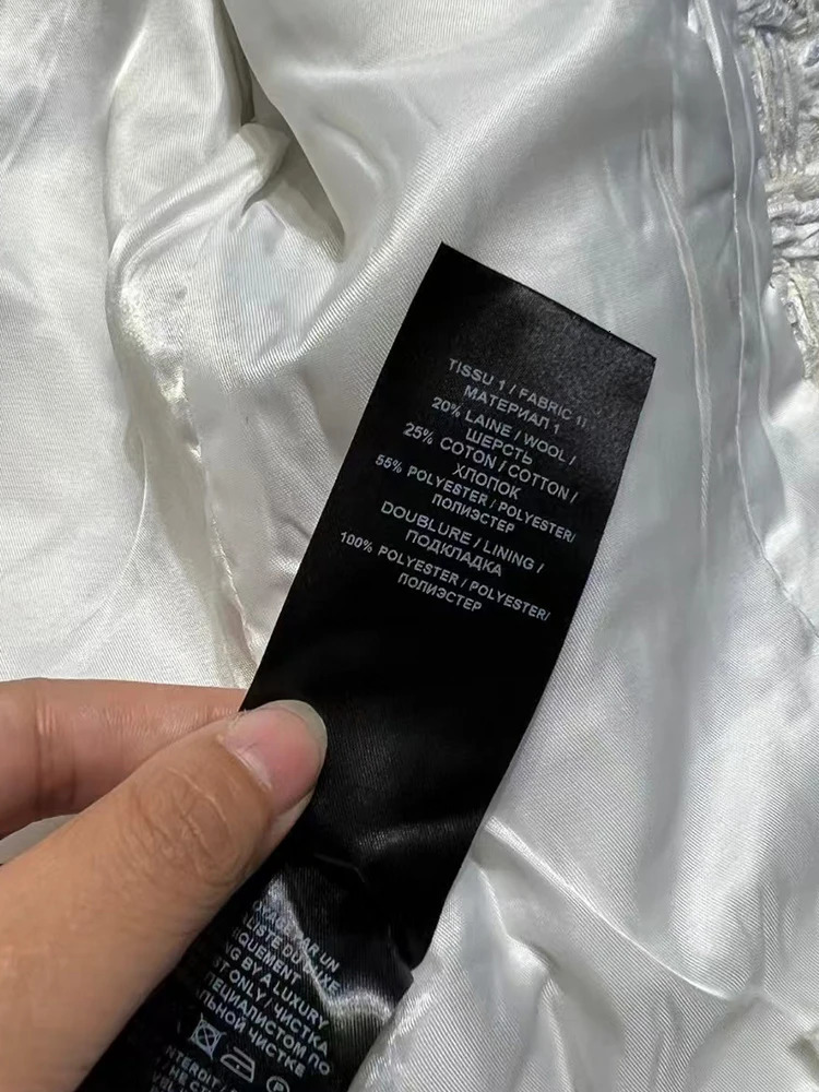 er vintage woven tweed pleated button pocket short sleeved jacket suitable for the fashionable one-piece jacket of autumn 240930