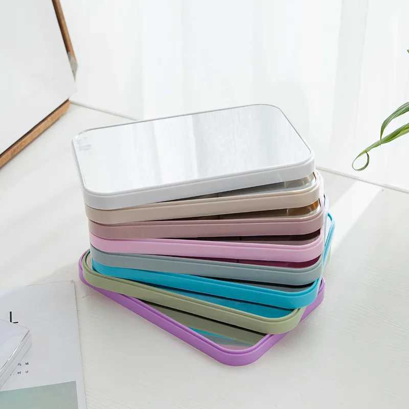 Handheld makeup mirror for travel and touch using folding stand W240813
