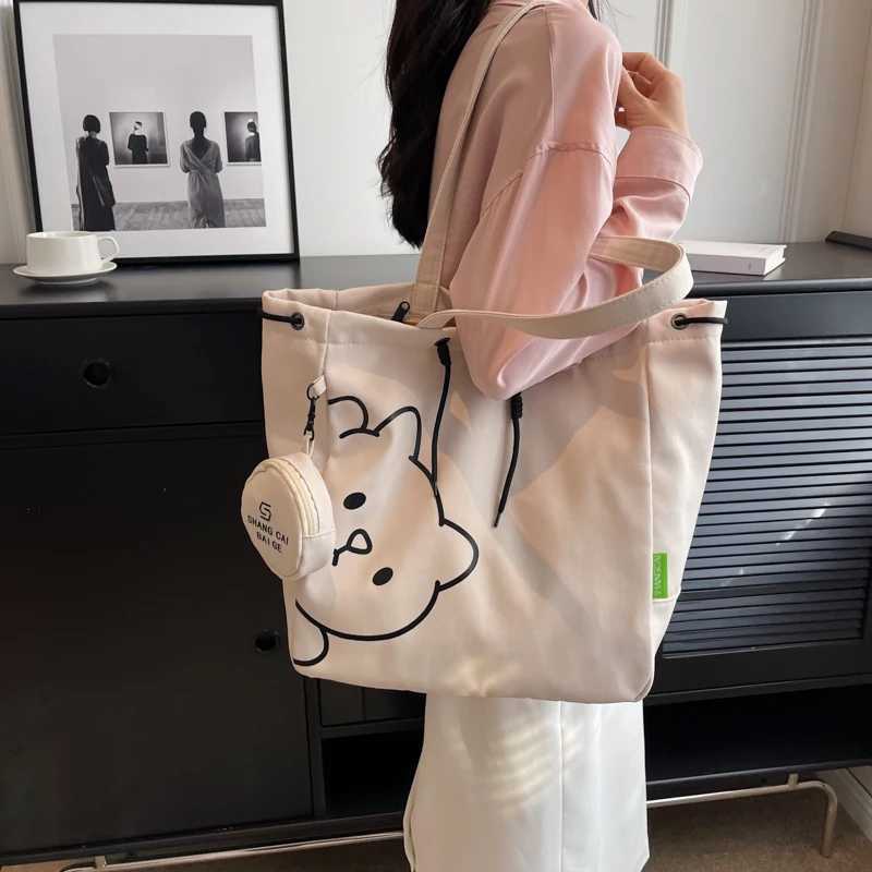 Cartoon printing canvas shoulder handbag womens latest trend in 2023 school handbag drawer design large capacity shopping handbag Y241011