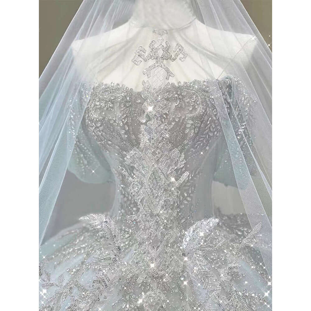 Light Blue Wedding Dresses Off The Pearl Sleeveless Shiny Beading Sexy Backless Sweep Train Bridal Gowns Boat Neck