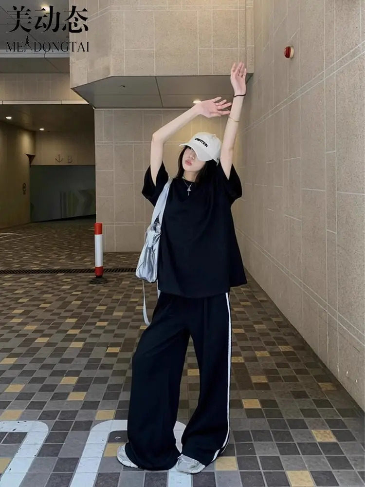 Spring and summer loose casual suit womens striped short sleeved Tshirt wearing floor sweeping wide leg pants twopiece set 241008