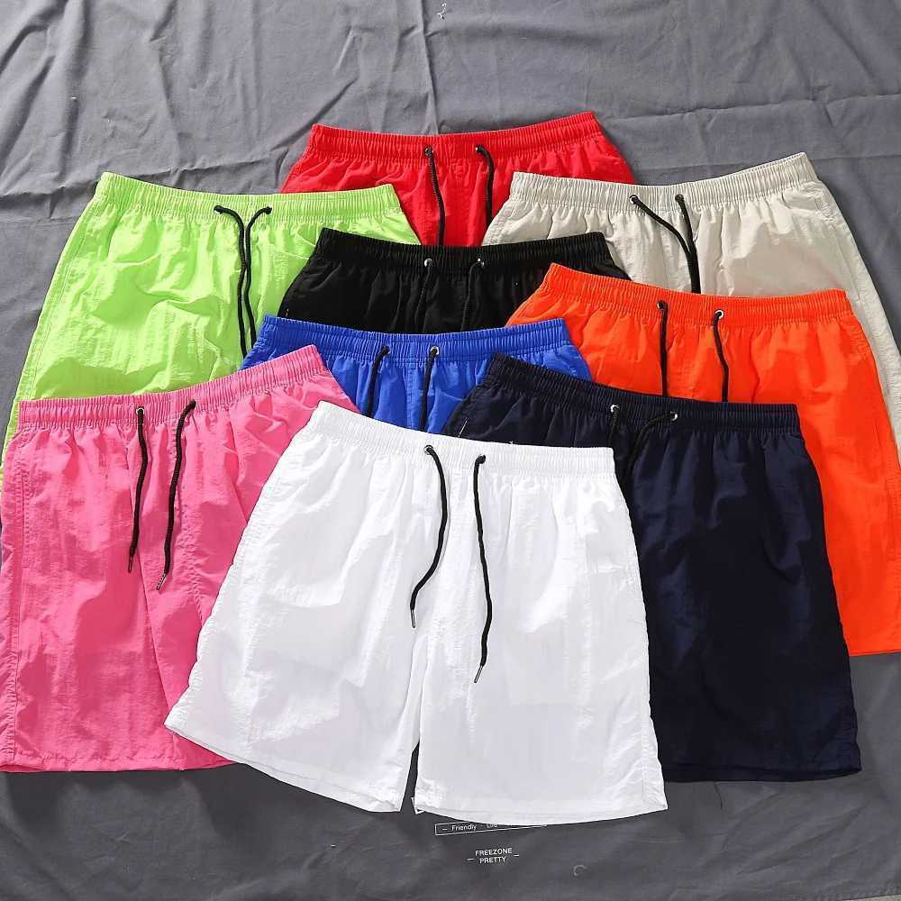 Mens shorts 2024 summer thin new hot solid casual beach shorts mens running fitness breathable sports five point pants W241010