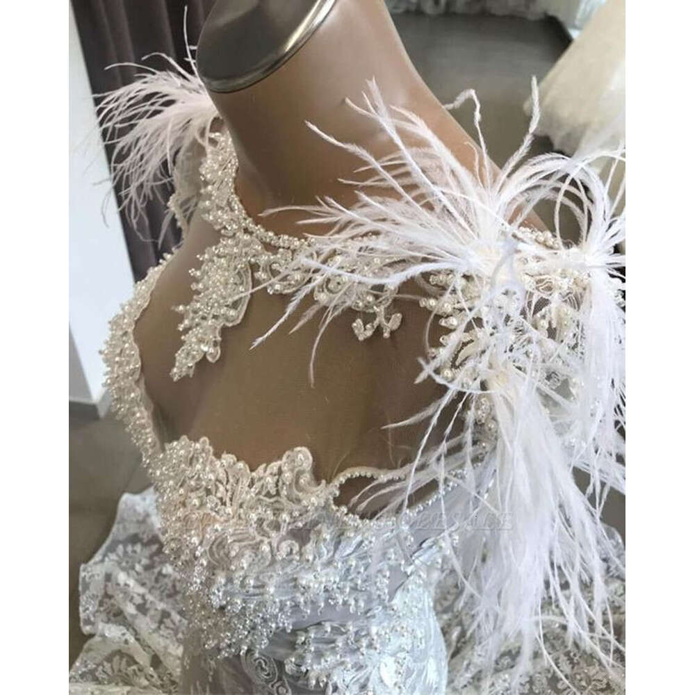 Exquisit Lace Mermaid Dress 2024 Pearls Sheer Neck Backless Cap Sleeves Wedding Bridal Dresses vestido de noiva