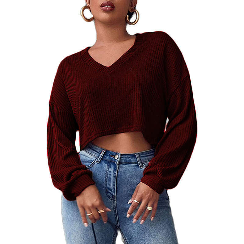 2022 autumn and winter new women's clothing solid color loose knit V-neck long sleeved exposed navel T-shirt for women