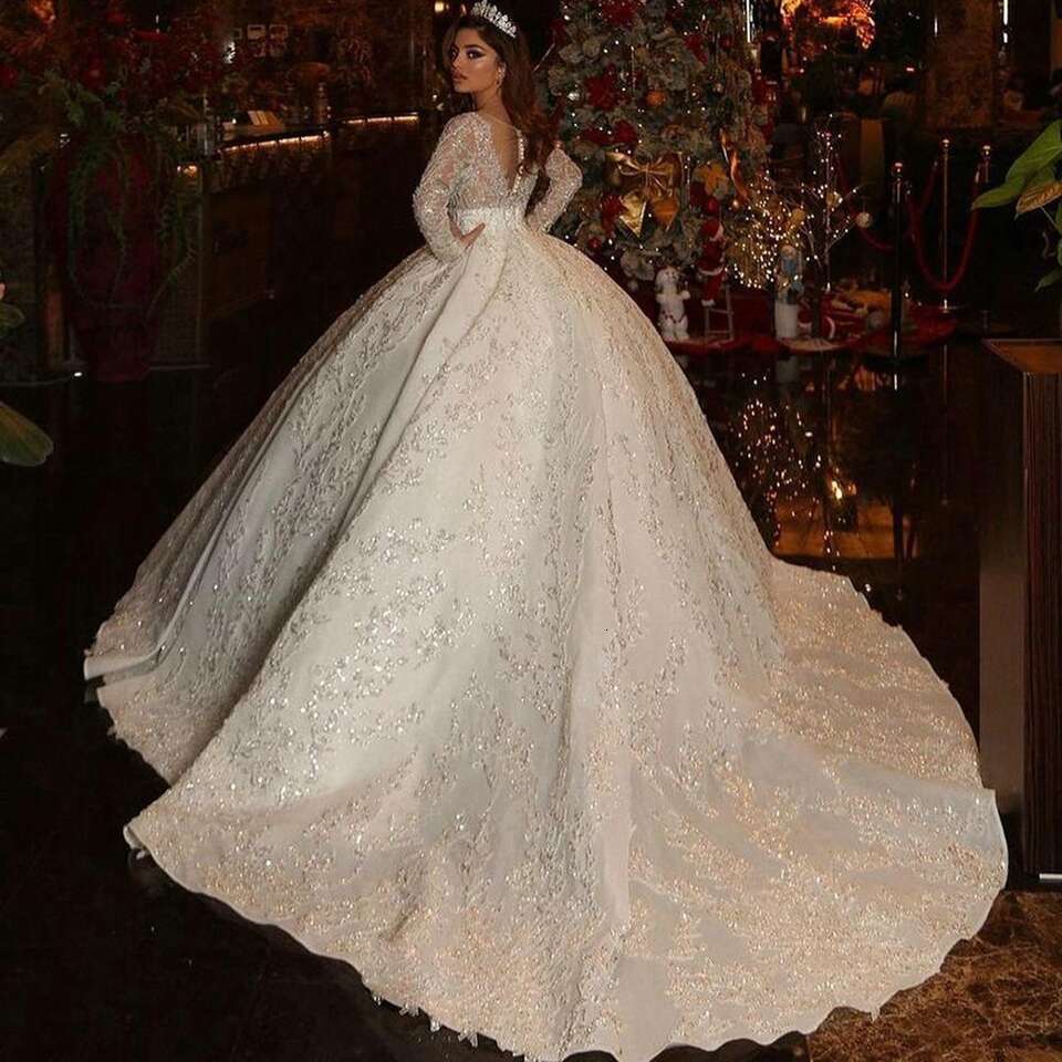 Saudi Arabic Ball Gown Illusion Back Long Sleeve Wedding Dresses 2023 Princess Sweetheart Glitter Sequined Appliques Bride Gowns