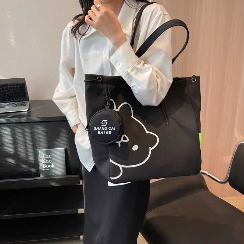 Cartoon printing canvas shoulder handbag womens latest trend in 2023 school handbag drawer design large capacity shopping handbag Y241011