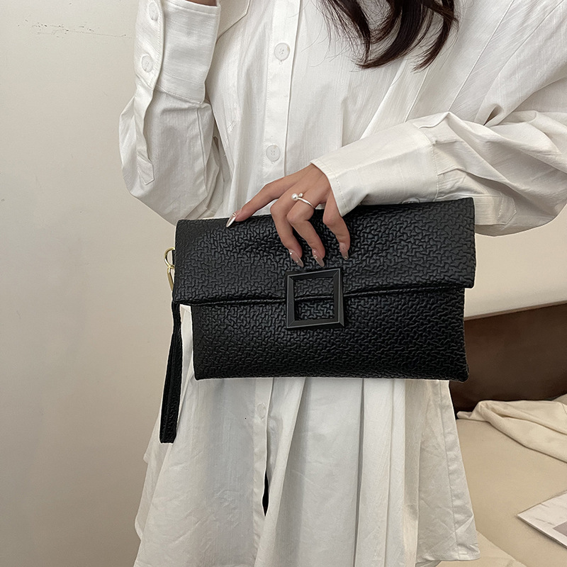 Fashionable and minimalist casual for women's new solid color envelope bag, zero wallet, handbag