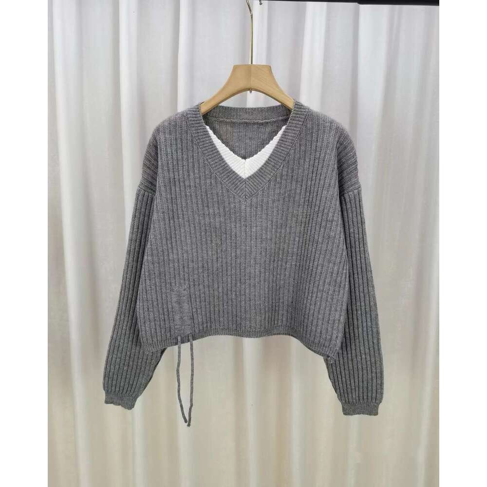 French V-neck fake two piece knitted sweater for women in autumn 2025 new style, slim and versatile, drawstring tied loose top trendy