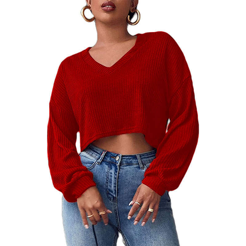 2022 autumn and winter new women's clothing solid color loose knit V-neck long sleeved exposed navel T-shirt for women