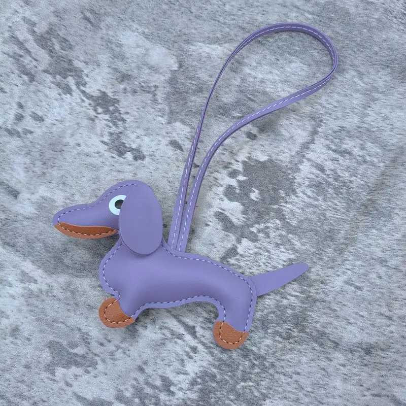 Keychains Lanyards Classic and Cute Leather Dog Keychain Pendant Cup Sausage Bag Charm Phone Pendant Tripod Keyring Accessories J241010