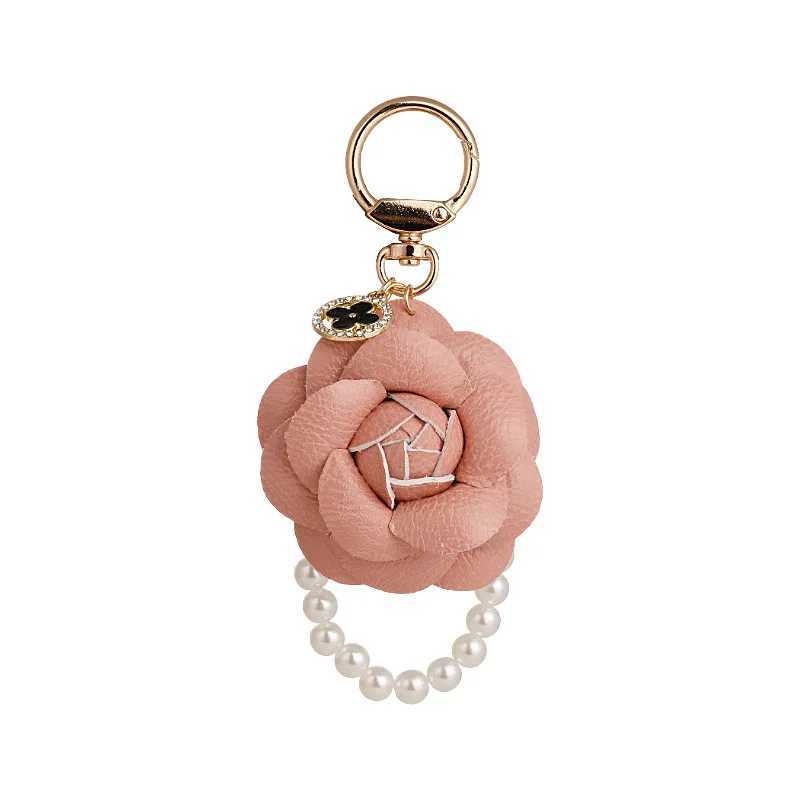 Keychains Lanyards Elegant PU leather rose camellia keychain imitates pearl keychain womens bag charm pendant pavilion car keychain J241010