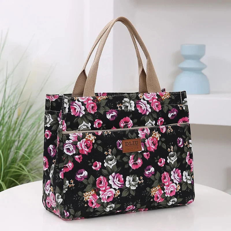 Fashionable printed handbags portable canvas lunch bags womens casual handbags and bento mom bags for picnic trips 241008