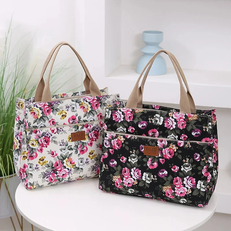 Fashionable printed handbags portable canvas lunch bags womens casual handbags and bento mom bags for picnic trips 241008