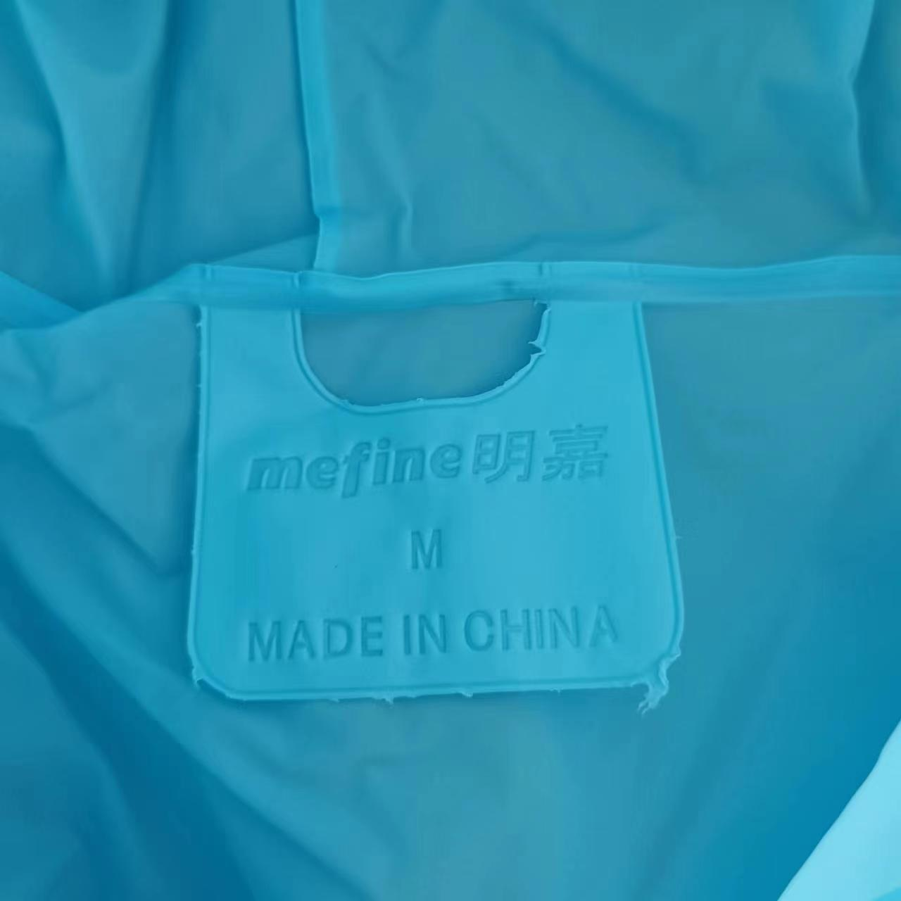 Folding children's hooded raincoat for easy travel