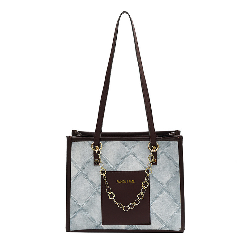 Women's large capacity commuting textured handbag winter new versatile Korean version armpit tote women's bag