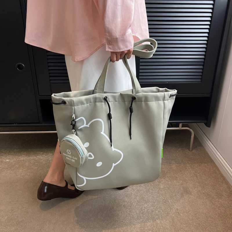 Cartoon printing canvas shoulder handbag womens latest trend in 2023 school handbag drawer design large capacity shopping handbag Y241011