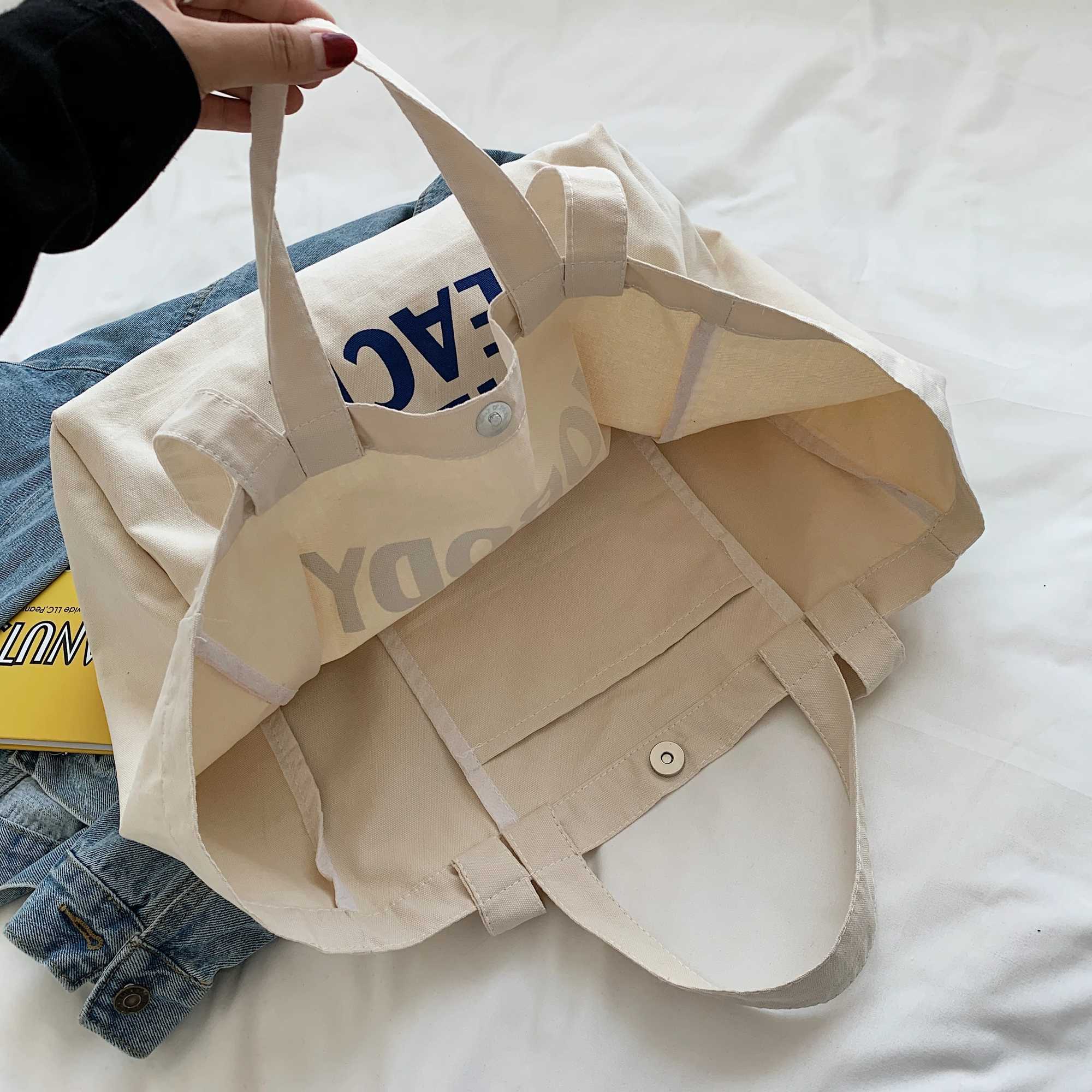 1 large capacity handbag fashionable shoulder bag womens work bag commuting canvas handbag Y241011