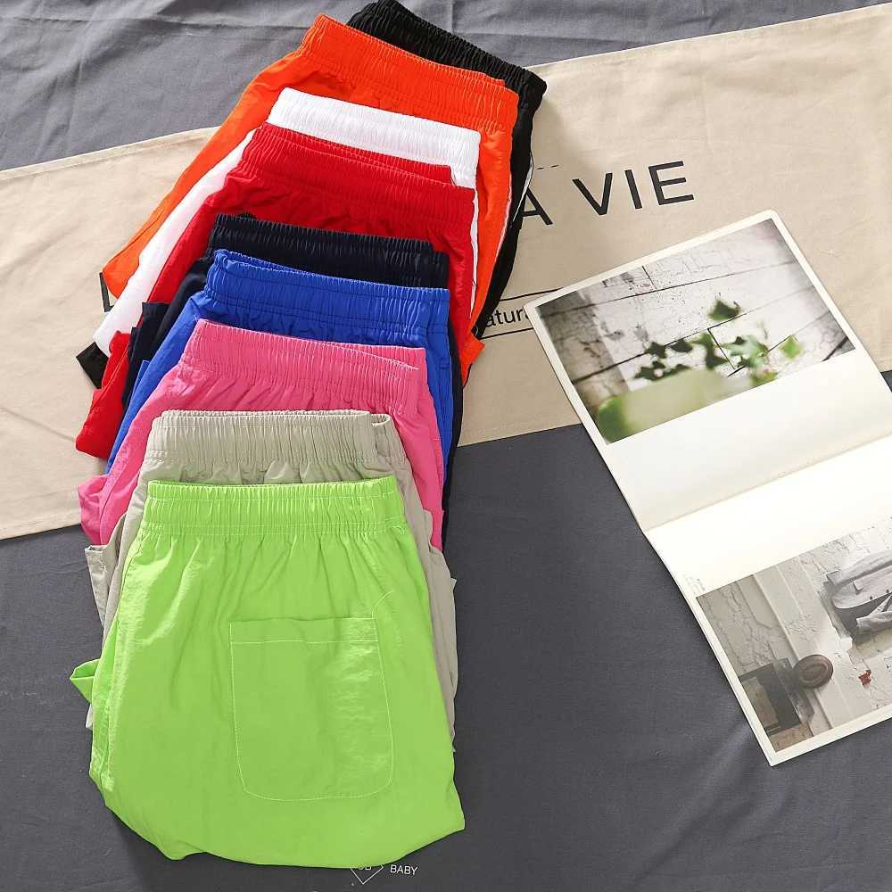 Mens shorts 2024 summer thin new hot solid casual beach shorts mens running fitness breathable sports five point pants W241010