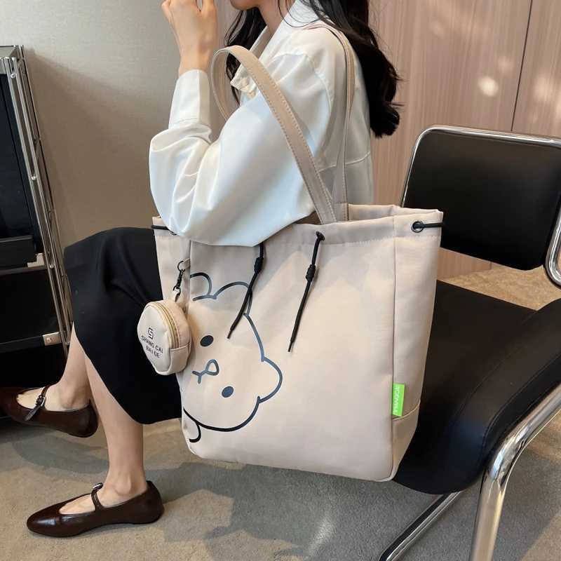 Cartoon printing canvas shoulder handbag womens latest trend in 2023 school handbag drawer design large capacity shopping handbag Y241011