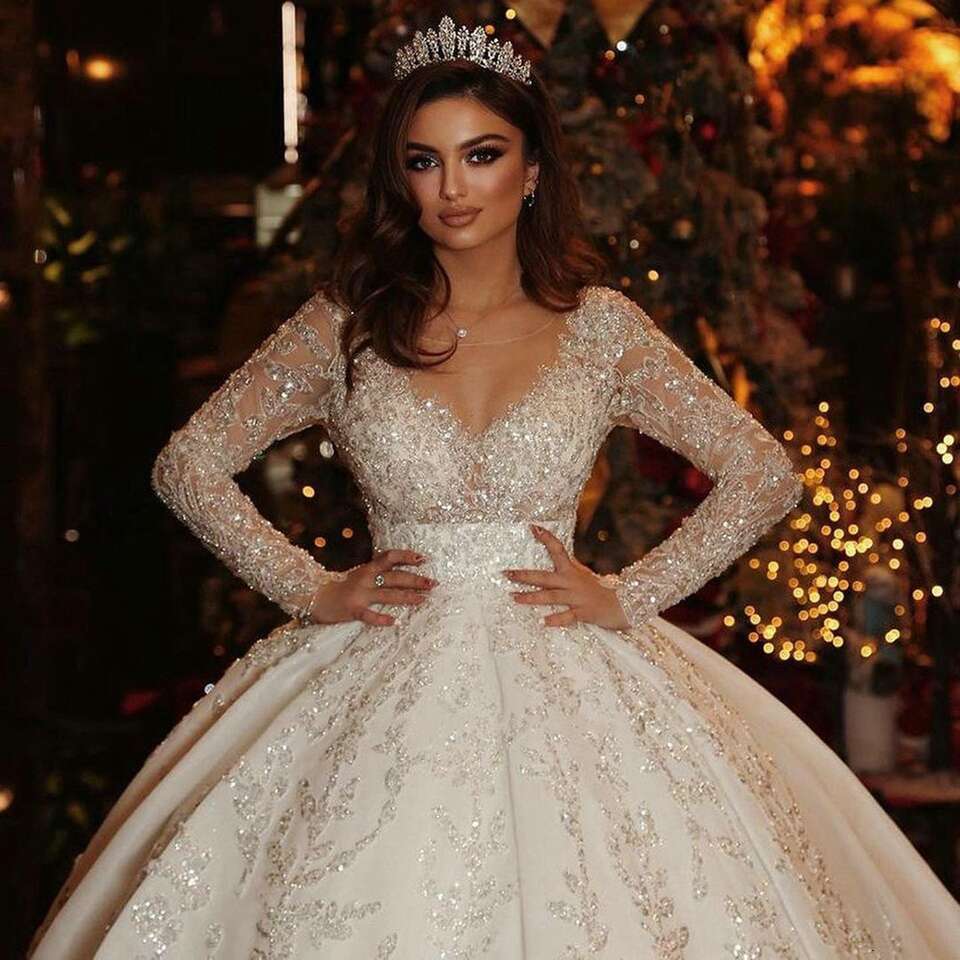 Saudi Arabic Ball Gown Illusion Back Long Sleeve Wedding Dresses 2023 Princess Sweetheart Glitter Sequined Appliques Bride Gowns