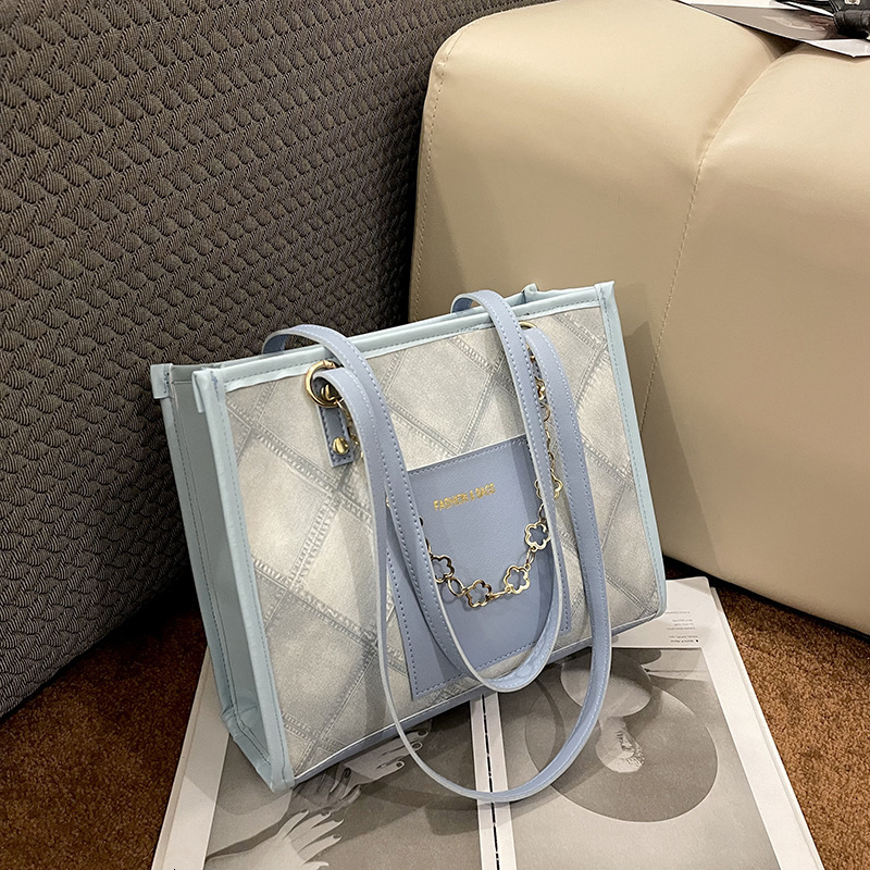 Women's large capacity commuting textured handbag winter new versatile Korean version armpit tote women's bag