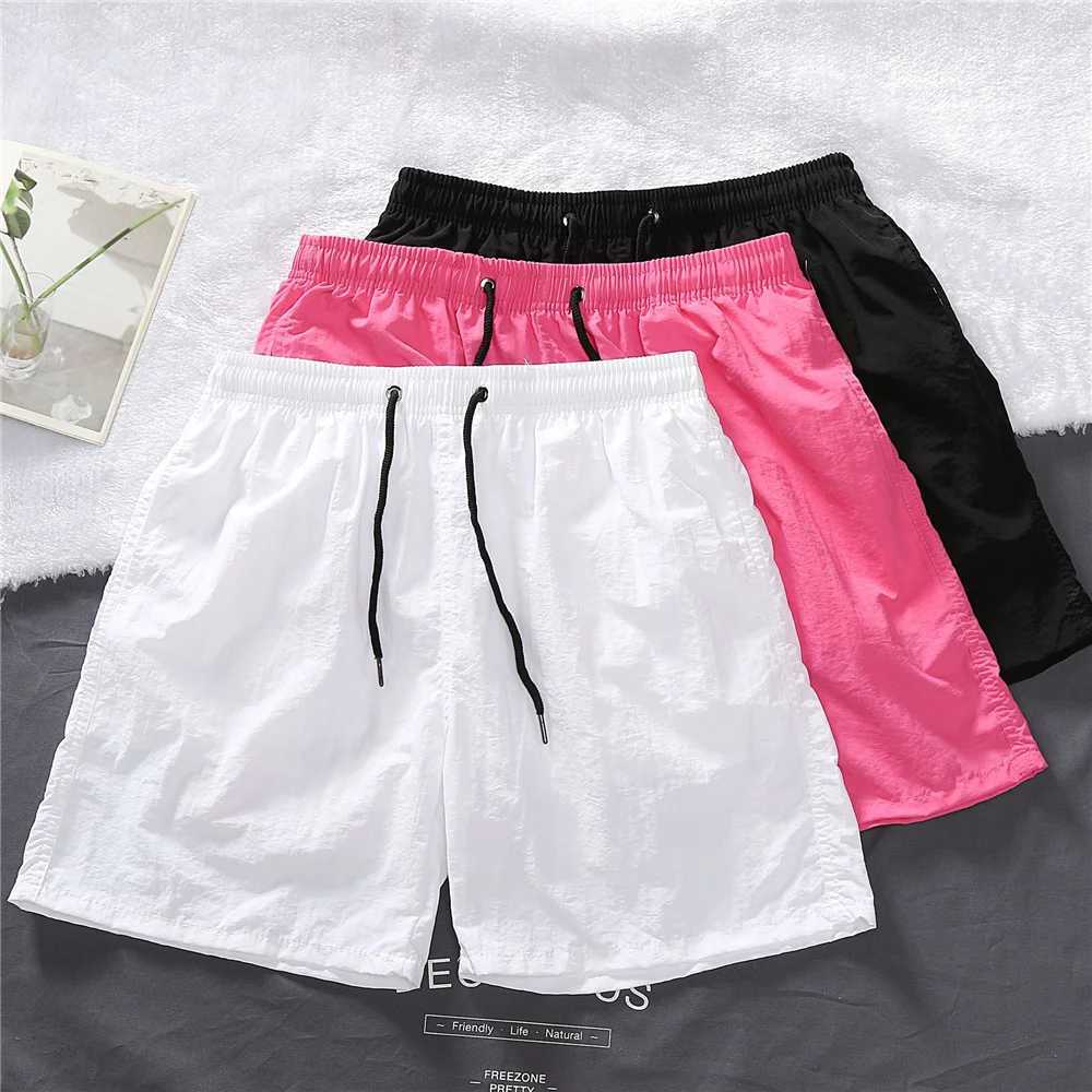 Mens shorts 2024 summer thin new hot solid casual beach shorts mens running fitness breathable sports five point pants W241010