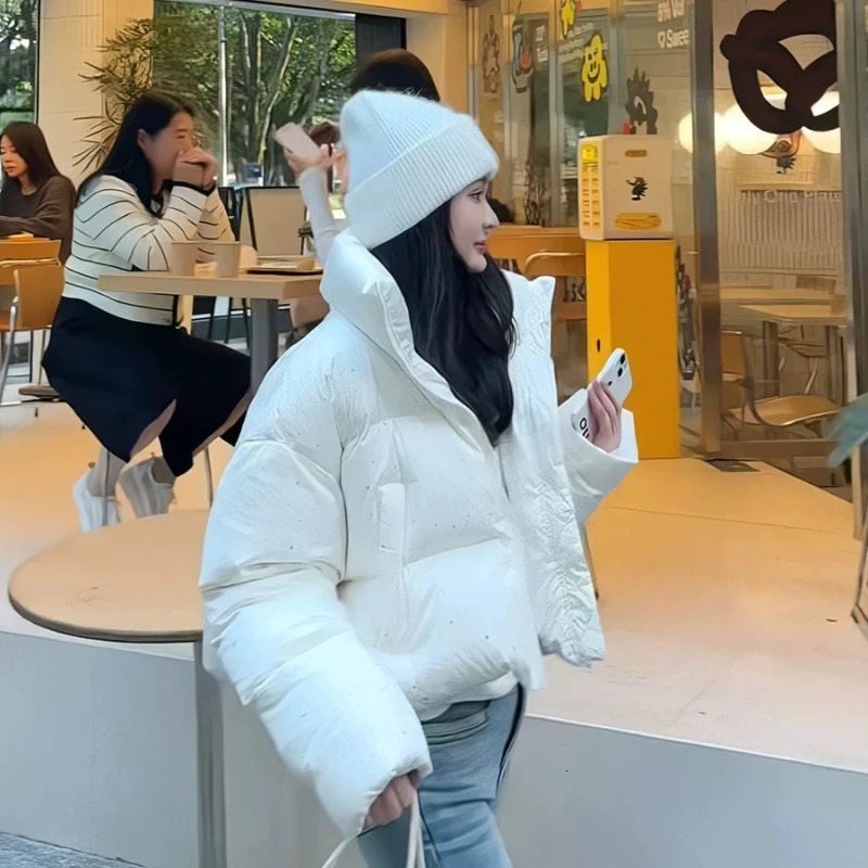 Womens stand up collar inflatable jacket thick loose jacket Rhinestone trend high-end jacket winter 241009