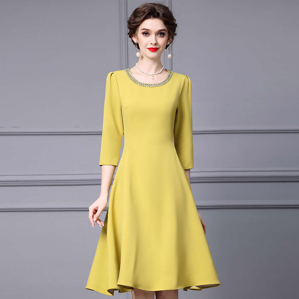 Smart yellow gentle socialite temperament big umbrella skirt high-end luxury nail diamond round neck high waisted dress autumn 2024