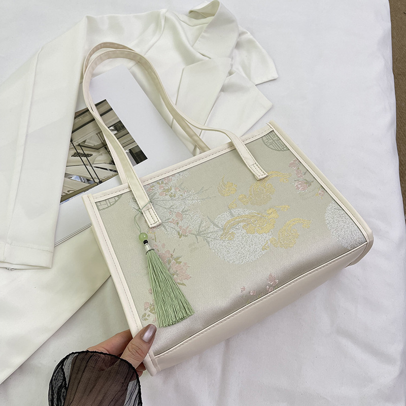 New tassel bucket for women Chinese style hand-held shoulder embroidered commuting tote bag