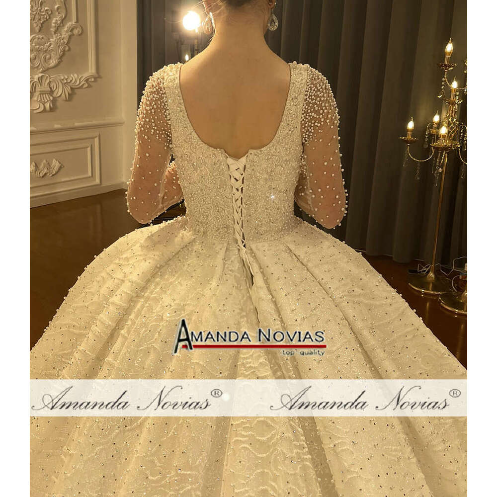 Amanda Novias Beautiful Pearls Wedding Dress