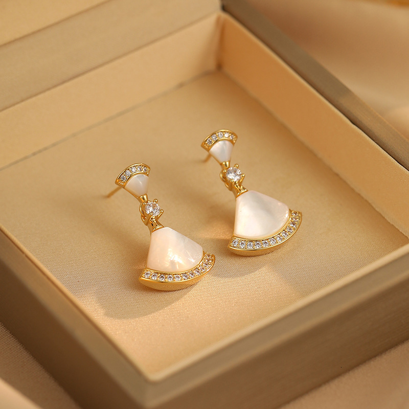 Fan shaped mother of pearl for women high-end feel a light temperament. New fashionable and versatile earrings with exquisite design